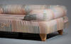 A close up of the Pawsteps Natural Bolster dog bed