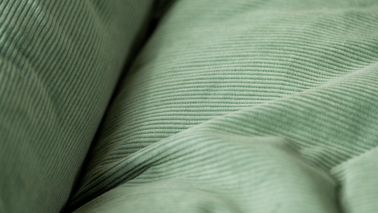 detail of cord bed in gardenia sage