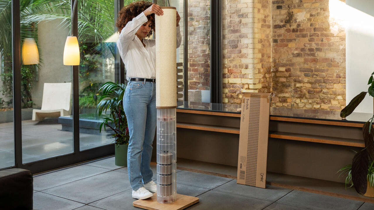 woman easily swapping out the sleeves on her Switch cat scratcher