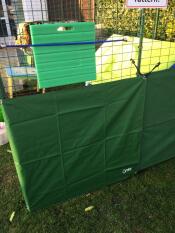 a all weather cover on an animal run