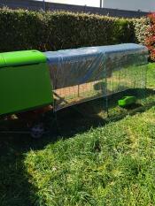The Combi Cover for Eglu Cube 2m attached to the run.