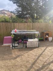 An Eglu Hutch attached to a Zippi run decorated with accessories.