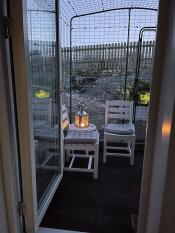 a catio against the wall of a house
