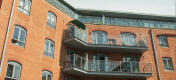 a cat balcony walk in run setup on a block of apartments