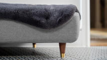 topology dog bed detail with brass capped legs