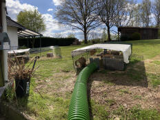 The green Zippi tunnel attached to a large Zippi enclosure.