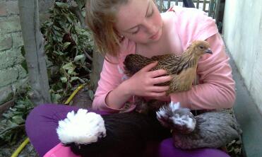 Katie with her chickens