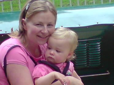 Olivia amd me on a steam train - she's only a little babe here