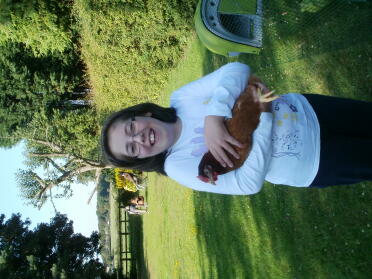 Girl holding Gingernut Chicken