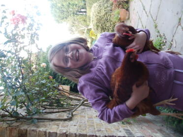 Girl holding Gingernut Chicken