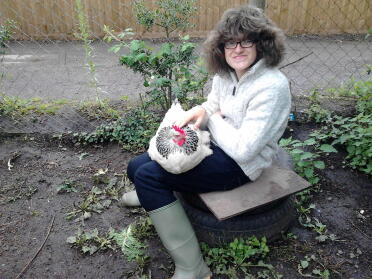 Enjoying the company of my light sussex chickens.