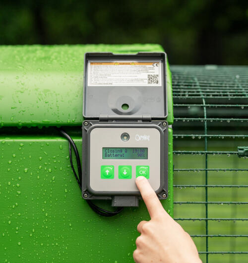 finger pressing light sensor control panel