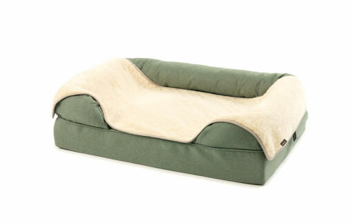 Plush Grey and Fur Blanket on a Green Bolster Bed 36