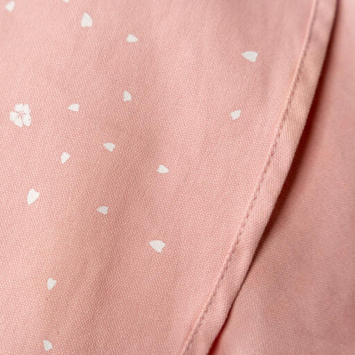 cherry blossom print on a baby pink piece of fabric