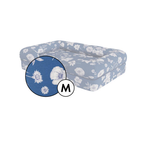 Medium bolster dog bed cover in blue floral Gardenia Porcelain print by Omlet.