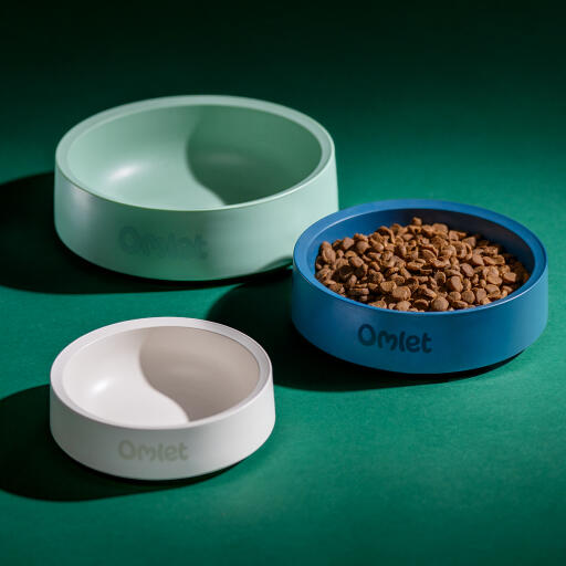 three sizes and colours of the omlet dog bowl collection