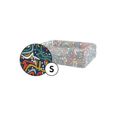 Small bolster dog bed cover in Zoomies print by Omlet.
