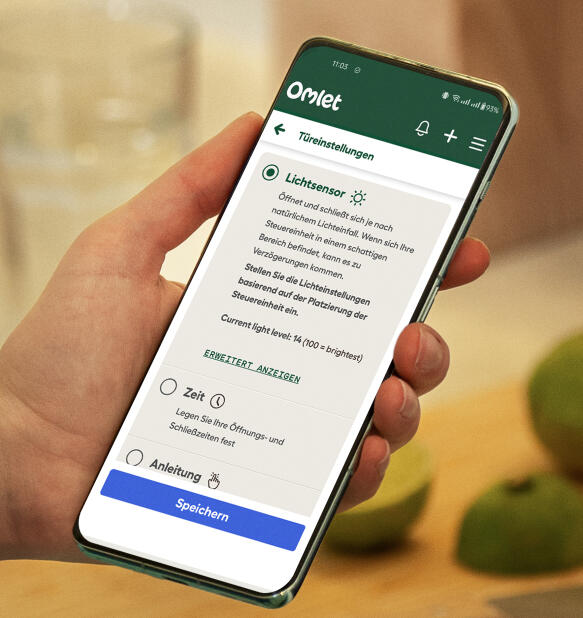 omlet app screen on a phone showing status of automatic door