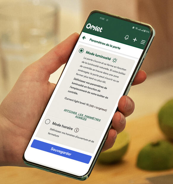 omlet app screen on a phone showing status of automatic door