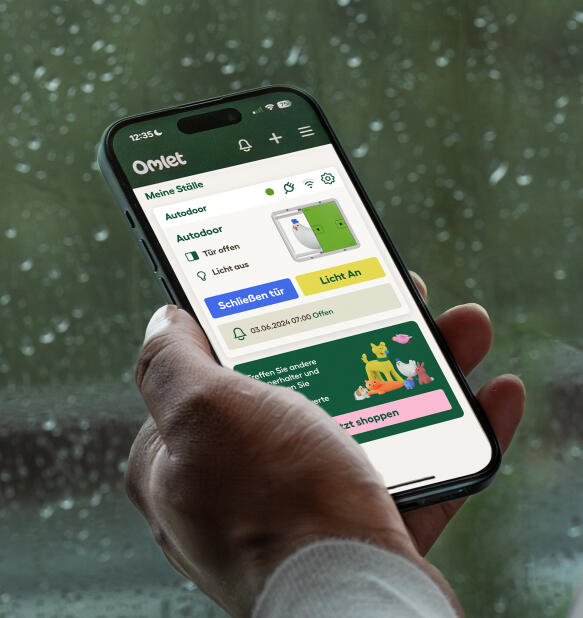 omlet app screen on a phone showing status of automatic door