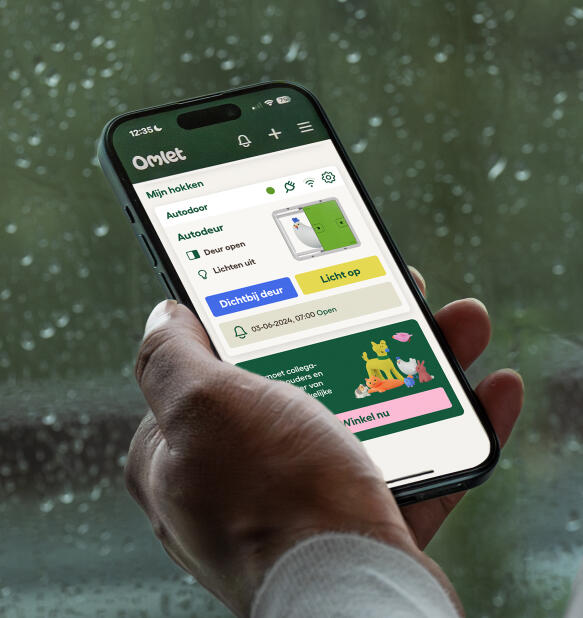 omlet app screen on a phone showing status of automatic door