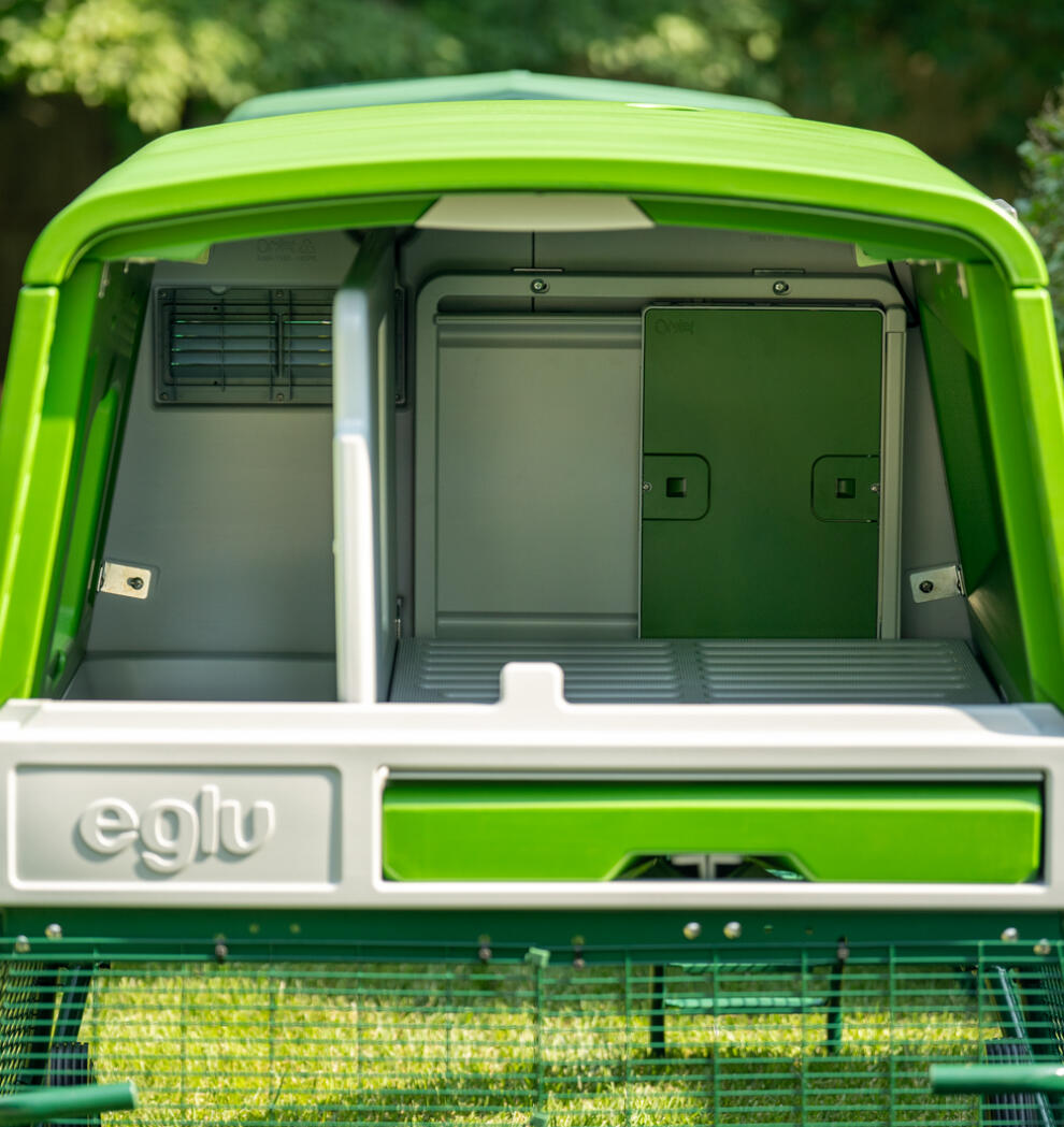 The Autodoor attached to the inside of the Eglu Cube chicken coop