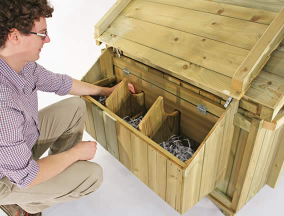 Collecting eggs from a Lenham chicken coop.