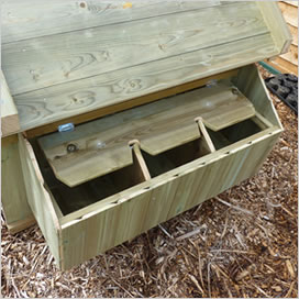 Nest box shutters of a Lenham chicken coop.